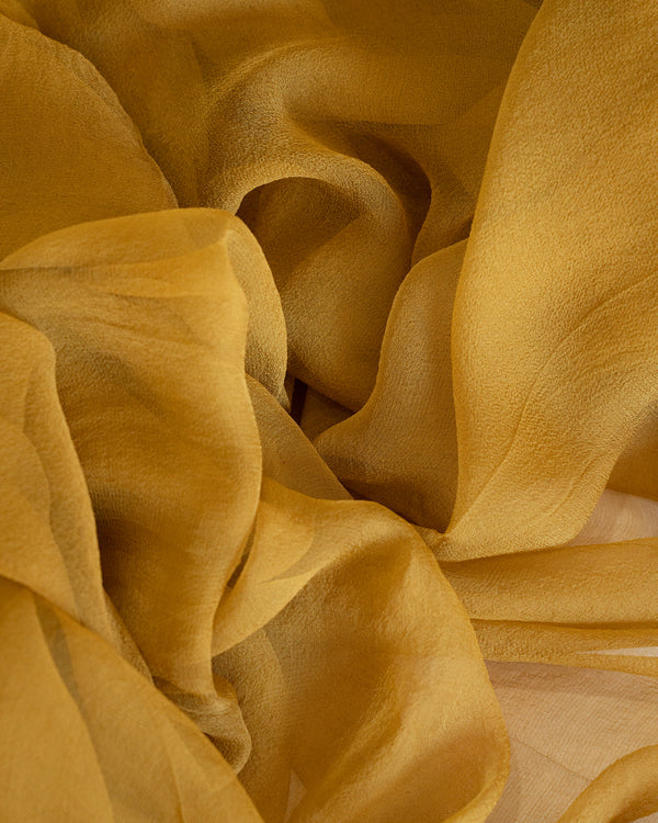 Tono + co Gossamer Silk Textile in Oro. Perfect for styling, tabletop design, detail work, or as a table runner. Find your inspiration through color and silk. Lovingly hand-dyed in Santa Ana, California and available in 24 signature colors. Check out our website for more styling, flat-lay, and color tips.