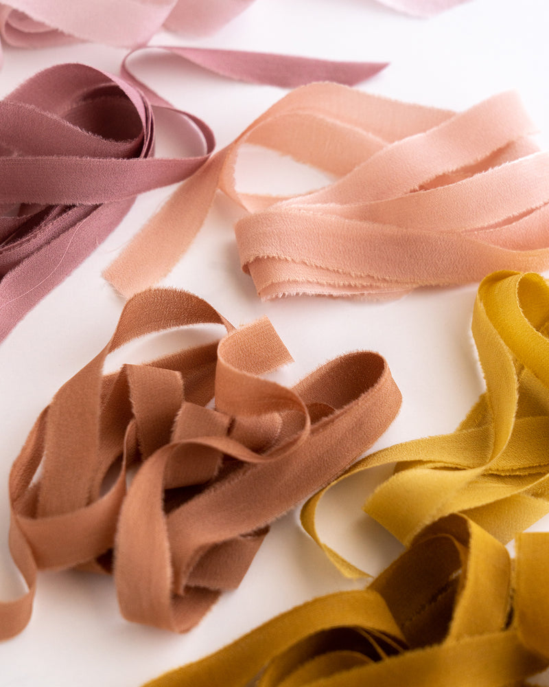 Tono + co Silk Ribbon Trim, featuring favorites from the Rouge + Earth + Golden Collections. Perfect for stationary styling, boutonnieres, and detail work. Lovingly hand-dyed in Santa Ana, California and available in 24 signature colors. Check out our website for more styling, flat-lay, and color inspiration.